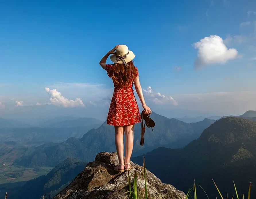 Woman enjoying mountain adventure view