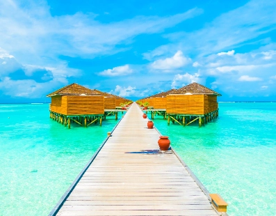 Overwater bungalows in tropical lagoon
